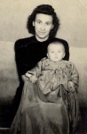 Irma Sebris ar dēlu Andreju viņa kristībās